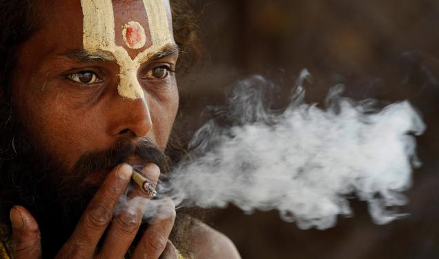 Bidi smoking Sadhu: Photo courtesy: The Hindu