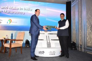 Maharashtra Chief Minister Devendra Fadnavis and Chuck Robbins, CEO, Cisco, launching the Cisco\'s Pune manufacturing unit, in Mumbai on October 12 (Photo: IANS) 