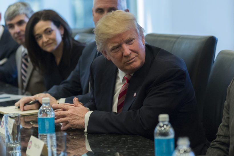 President-elect Donald Trump is seen at a meeting of technology leaders in the Trump Organization conference room at Trump Tower in New York, NY, USA on December 14, 2016. Credit: Albin Lohr-Jones / Pool via CNP